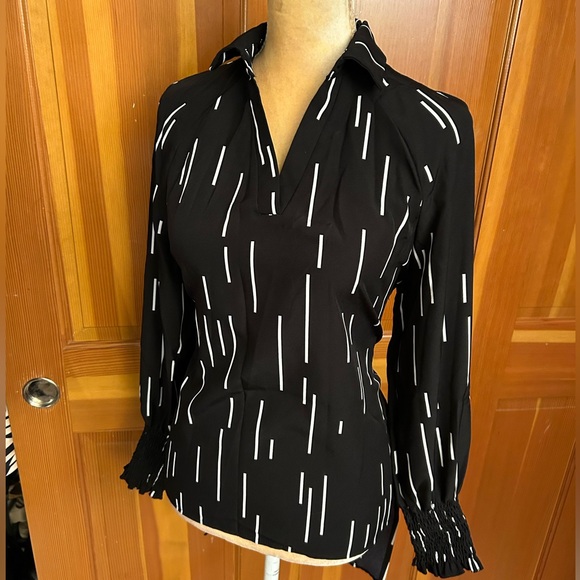 Low Hem Bishop sleeved Blouse - Picture 2 of 16